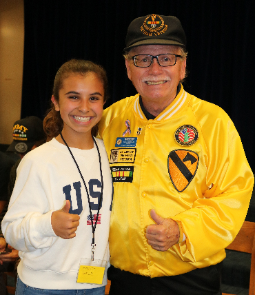 Vietnam veteran Ronnie Guyer and his granddaughter Emmey Guyer both give the thumbs up sign. Vietnam veteran Ronnie Guyer and his granddaughter Emmey Guyer both give the thumbs up sign.